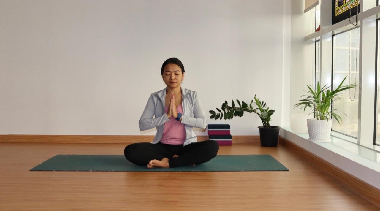 Private yoga and meditation session for stress relief in Dubai Sports City